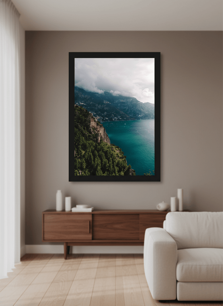 Modern wall art styled above a sofa in a neutral living room