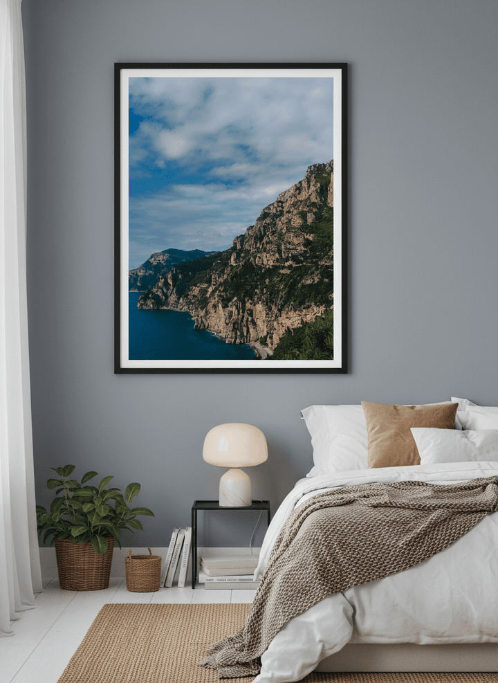 Minimalist artwork displayed in a calm, light-filled bedroom interior
