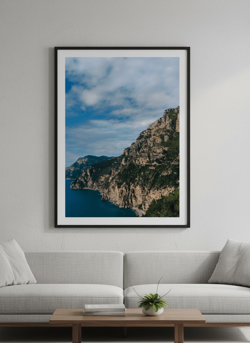 Modern wall art styled above a sofa in a neutral living room