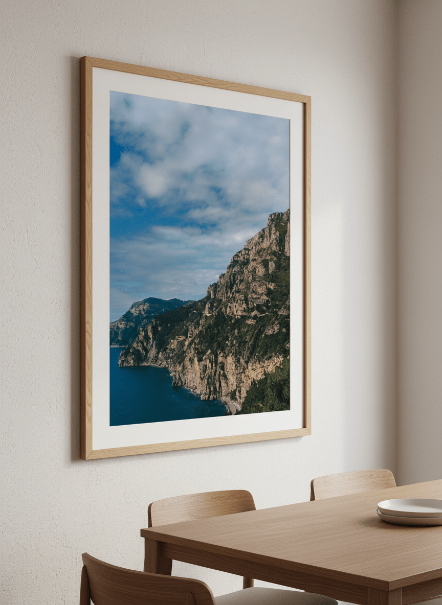 Wall art styled above a dining table in a contemporary home