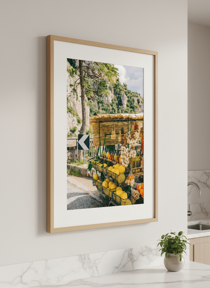 Artwork styled on the wall of a bright modern kitchen