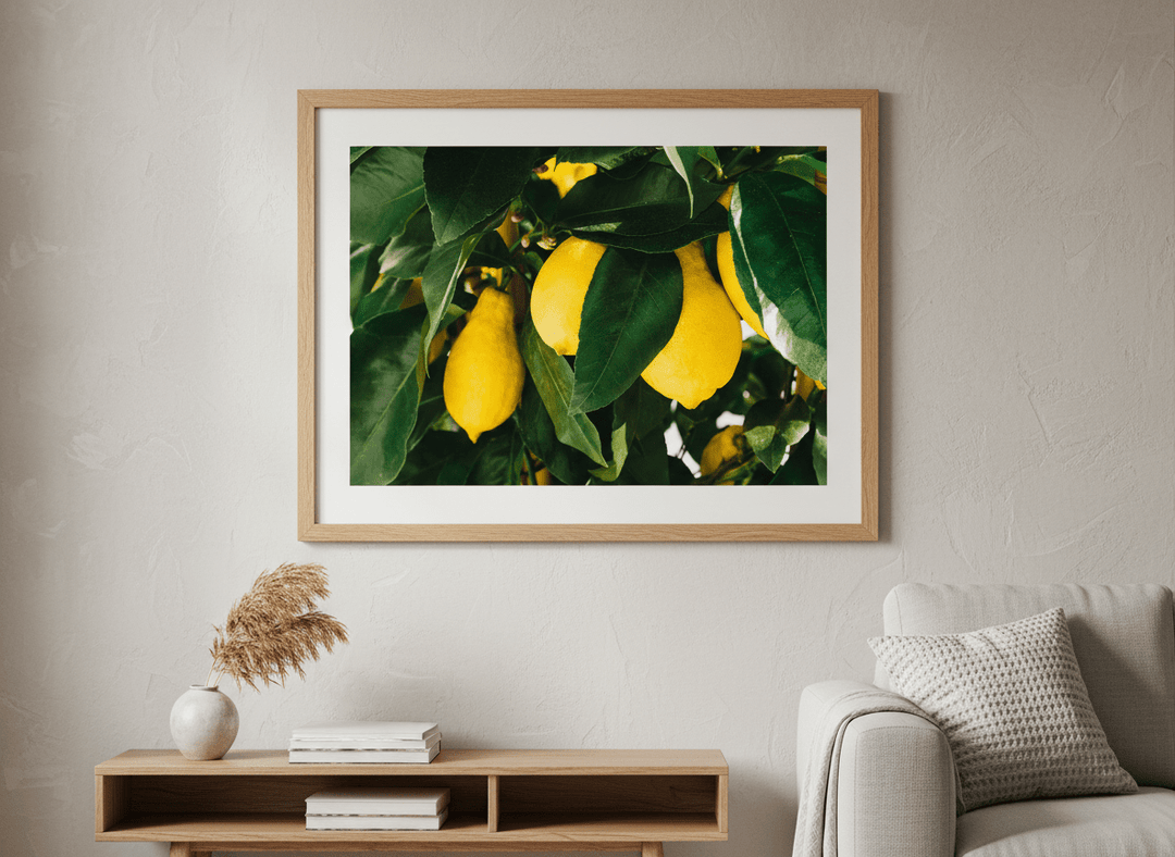 Modern wall art styled above a sofa in a neutral living room