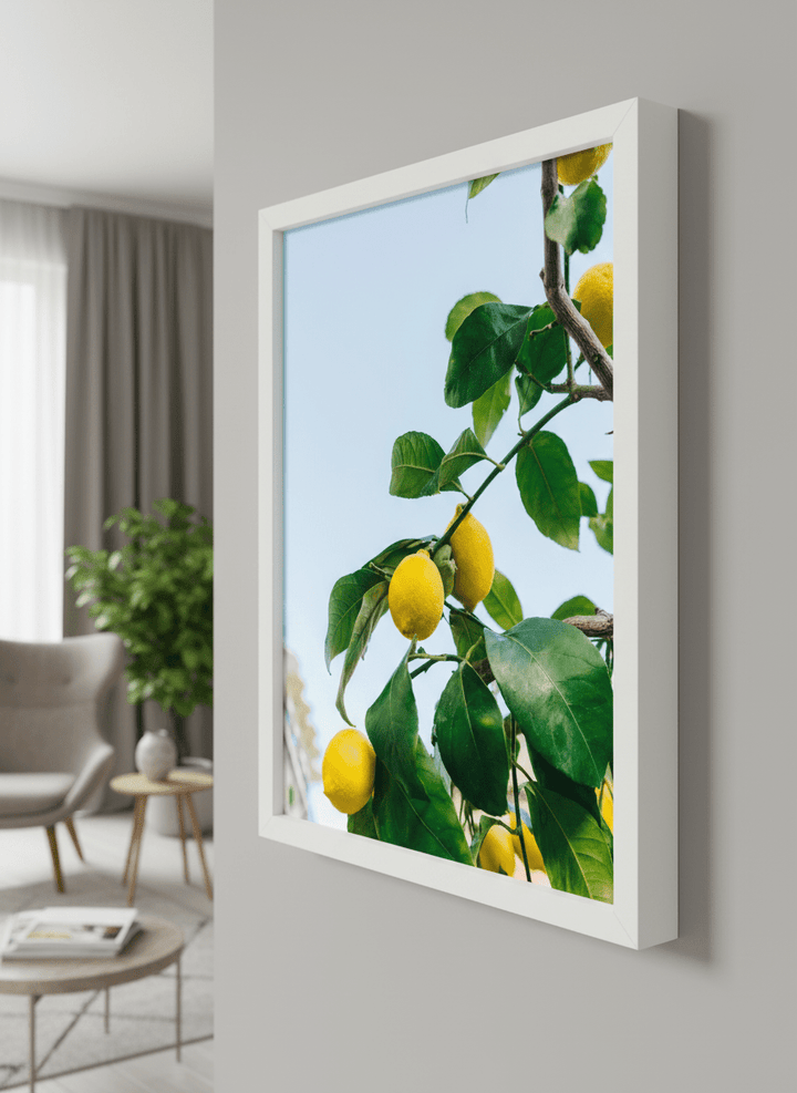 Modern wall art styled above a sofa in a neutral living room