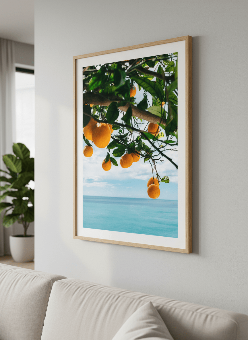 Modern wall art styled above a sofa in a neutral living room