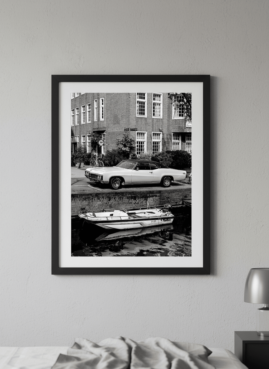 Minimalist artwork displayed in a calm, light-filled bedroom interior