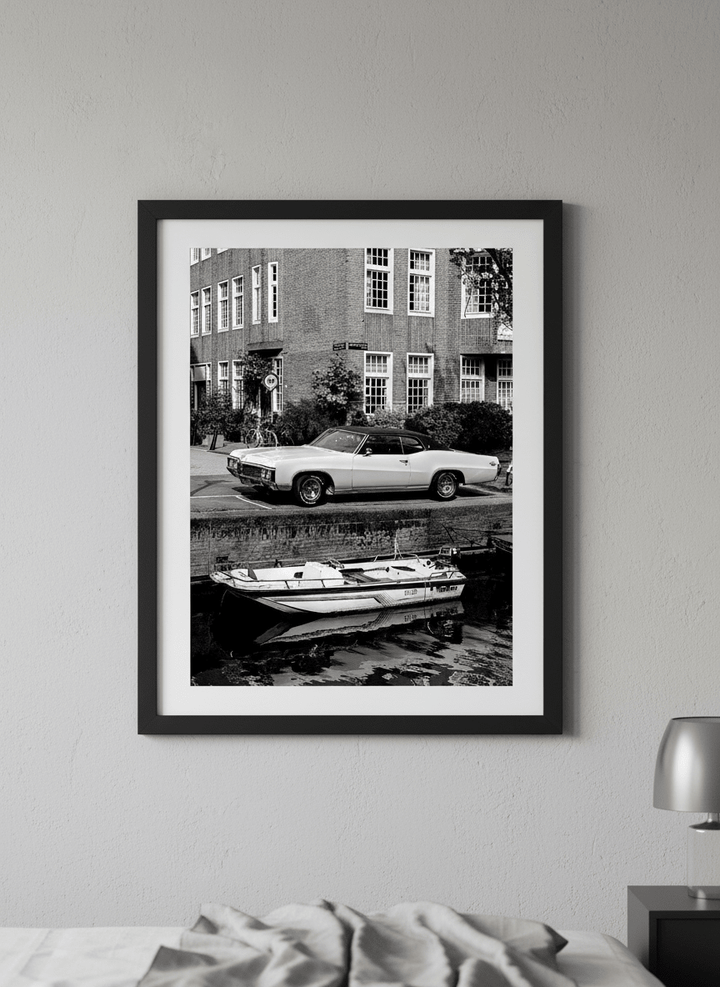 Minimalist artwork displayed in a calm, light-filled bedroom interior