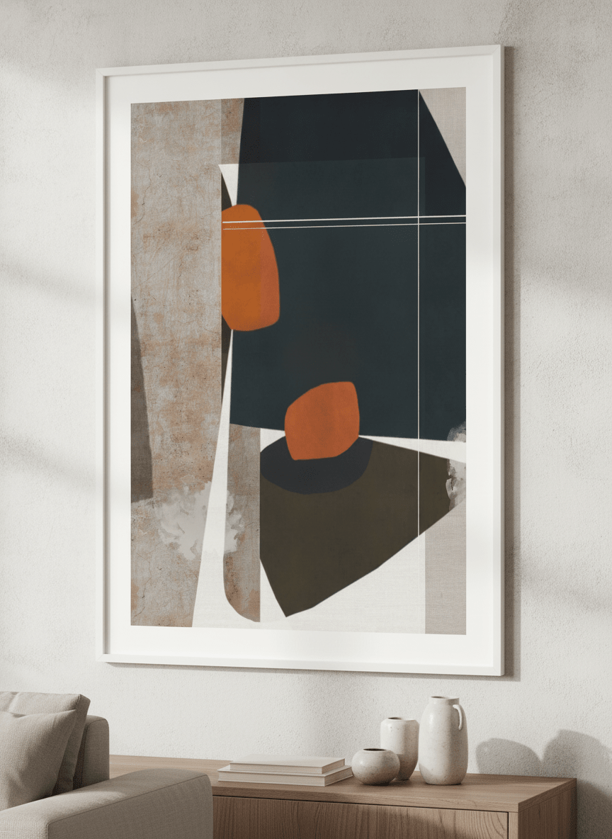 Modern wall art styled above a sofa in a neutral living room