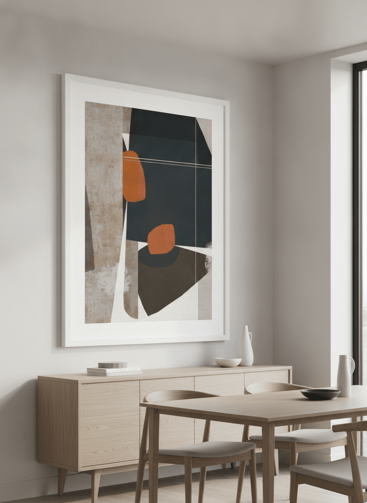 Wall art styled above a dining table in a contemporary home