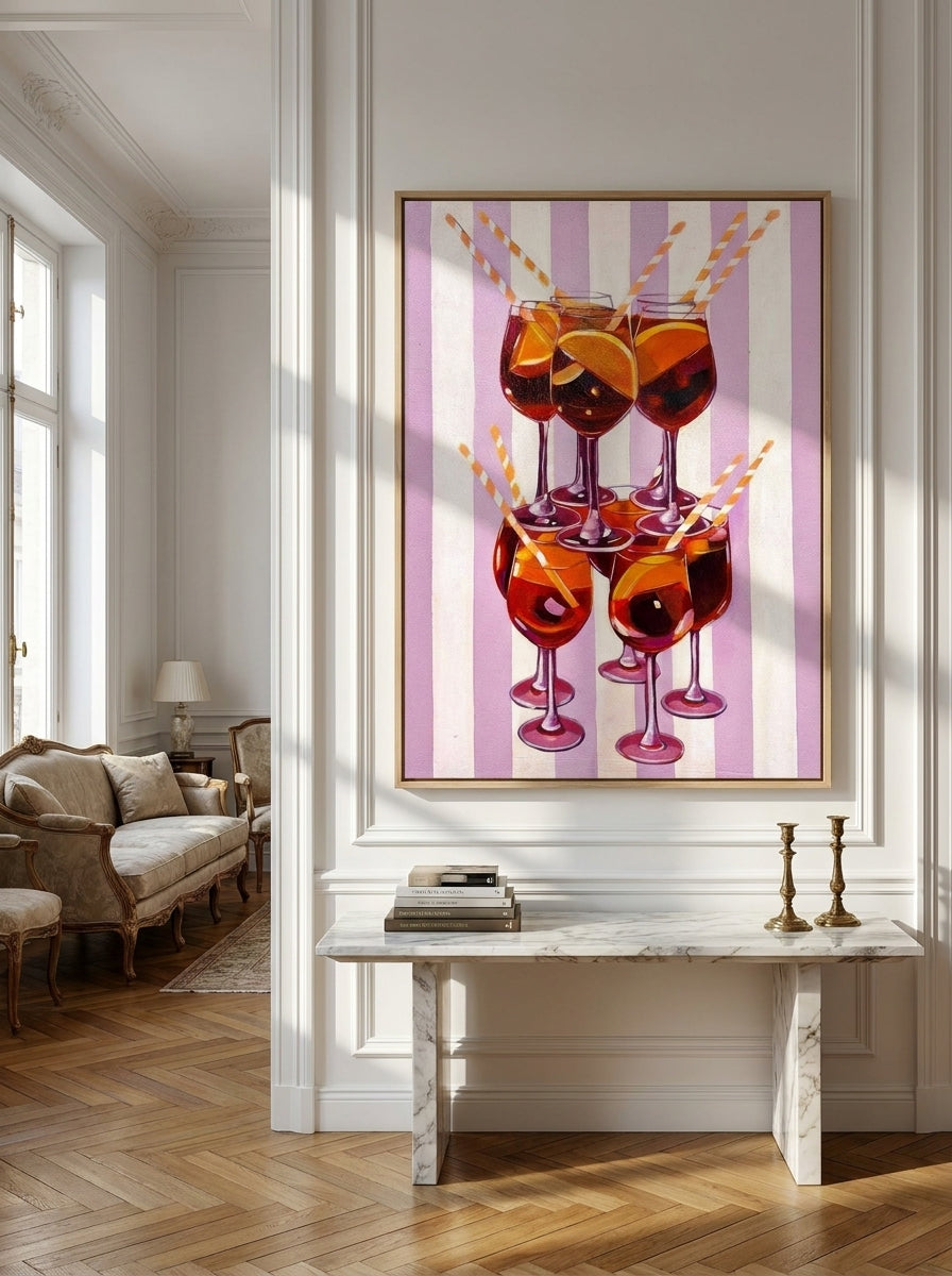Oversized statement canvas wall art with a natural timber surround styled on the wall in a Parisian living room