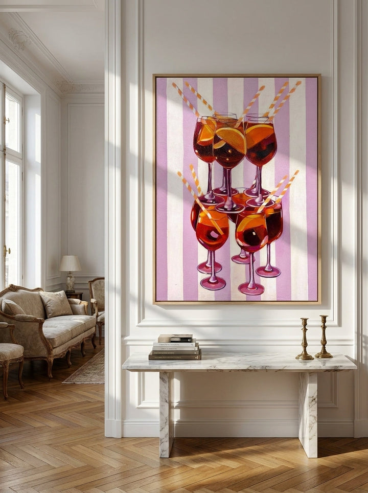 Oversized statement canvas wall art with a natural timber surround styled on the wall in a Parisian living room