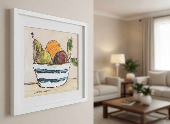 Modern wall art styled above a sofa in a neutral living room