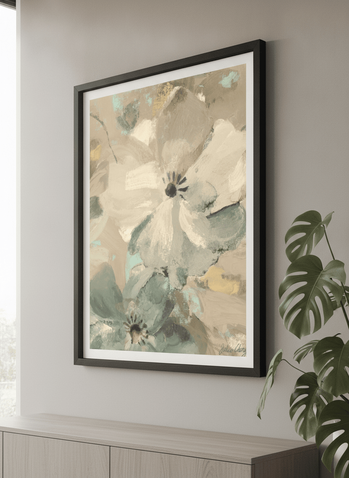 Modern wall art styled above a sofa in a neutral living room