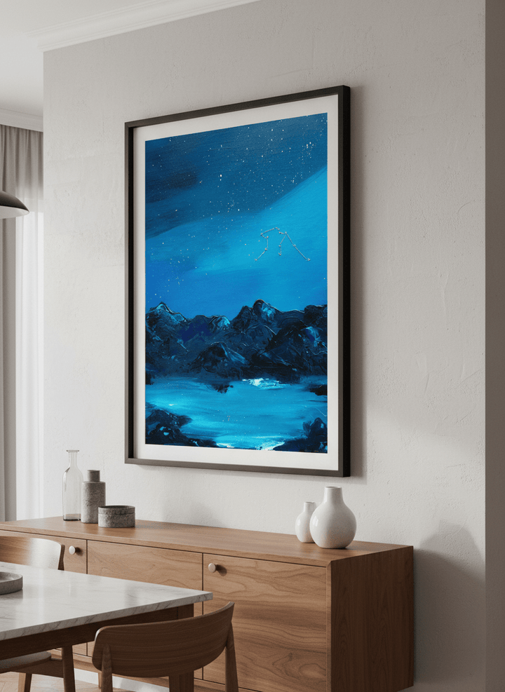 Wall art styled above a dining table in a contemporary home