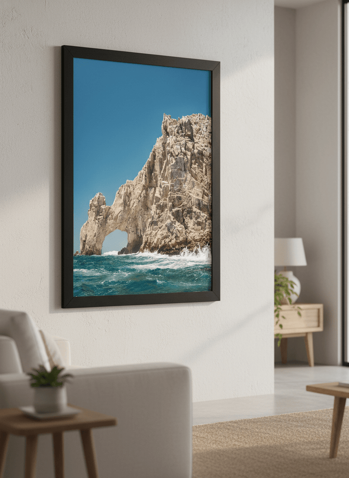 Modern wall art styled above a sofa in a neutral living room