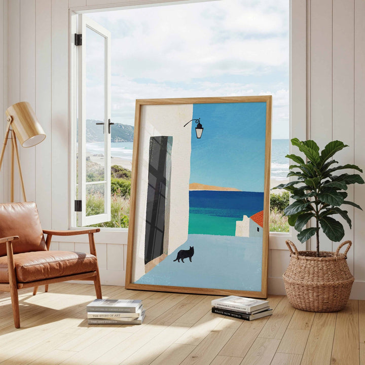 Abstract artwork in a modern living room with a view of the sea.