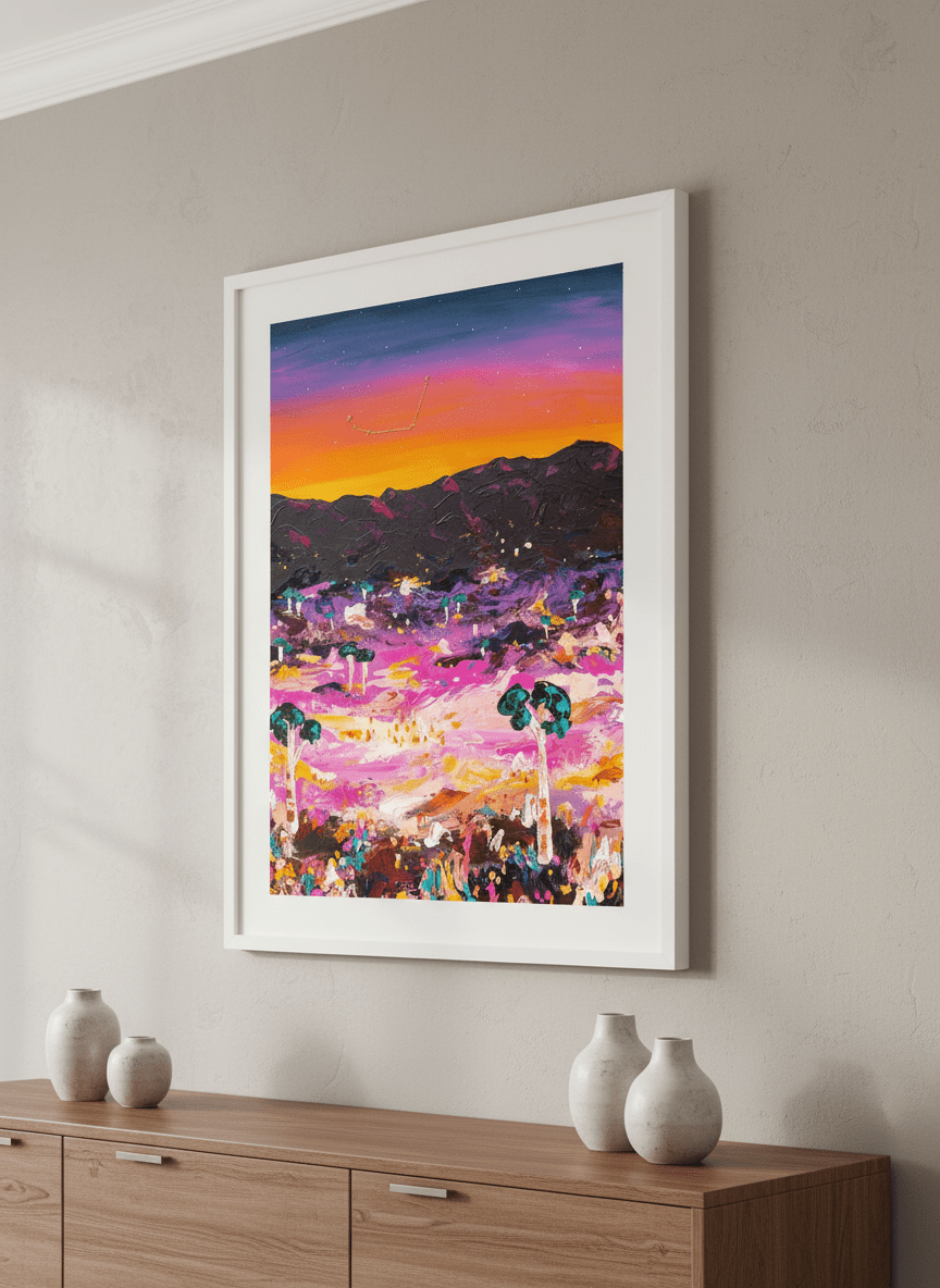 Wall art styled above a dining table in a contemporary home