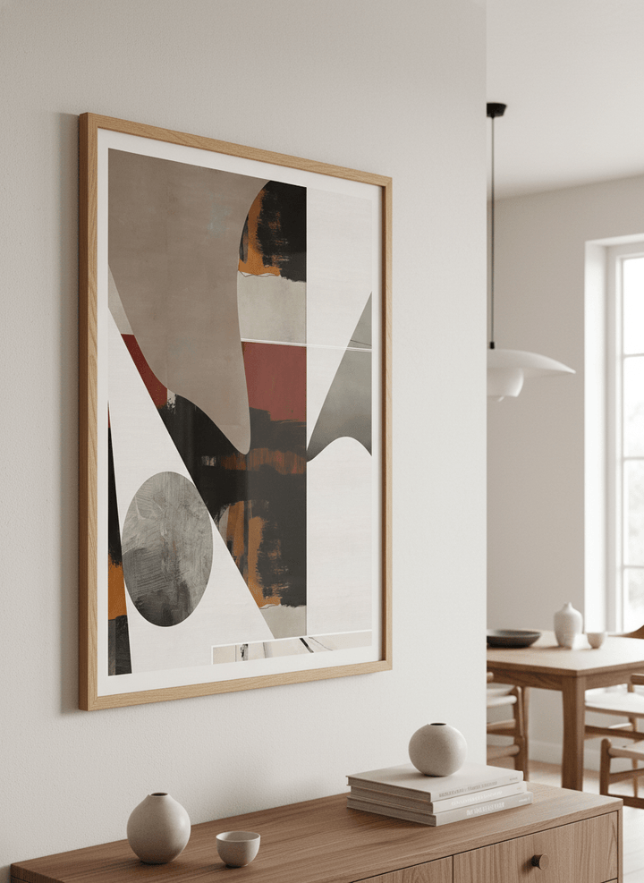 Wall art styled above a dining table in a contemporary home