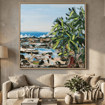 Oversized statement canvas wall art with a natural timber surround styled in a neutral living room