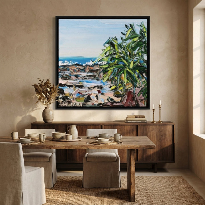 Canvas wall art with a black surround styled in a contemporary dining room
