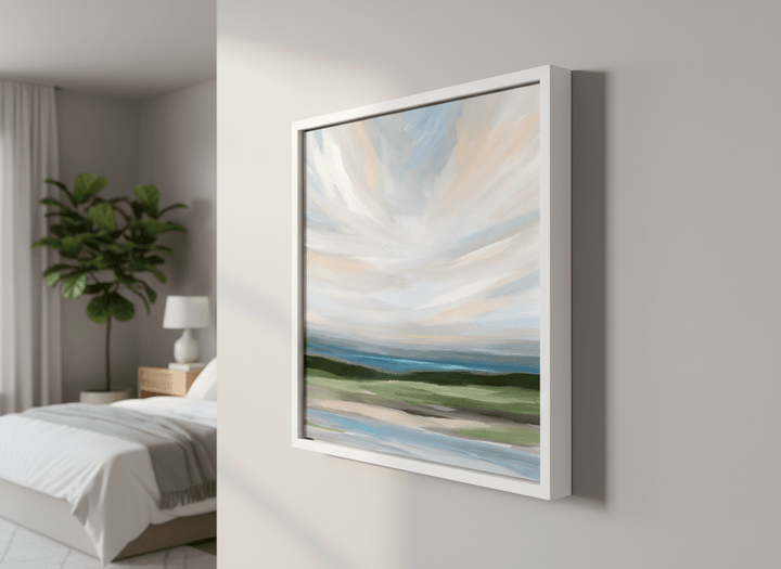 Minimalist artwork displayed in a calm, light-filled bedroom interior