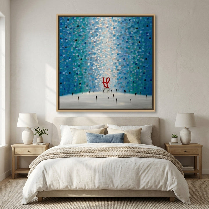 Canvas wall art with a natural timber surround styled in a calm, light-filled bedroom