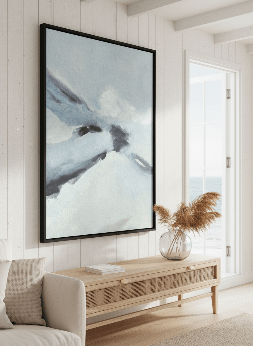 Neutral wall art displayed in a sunny coastal beach house