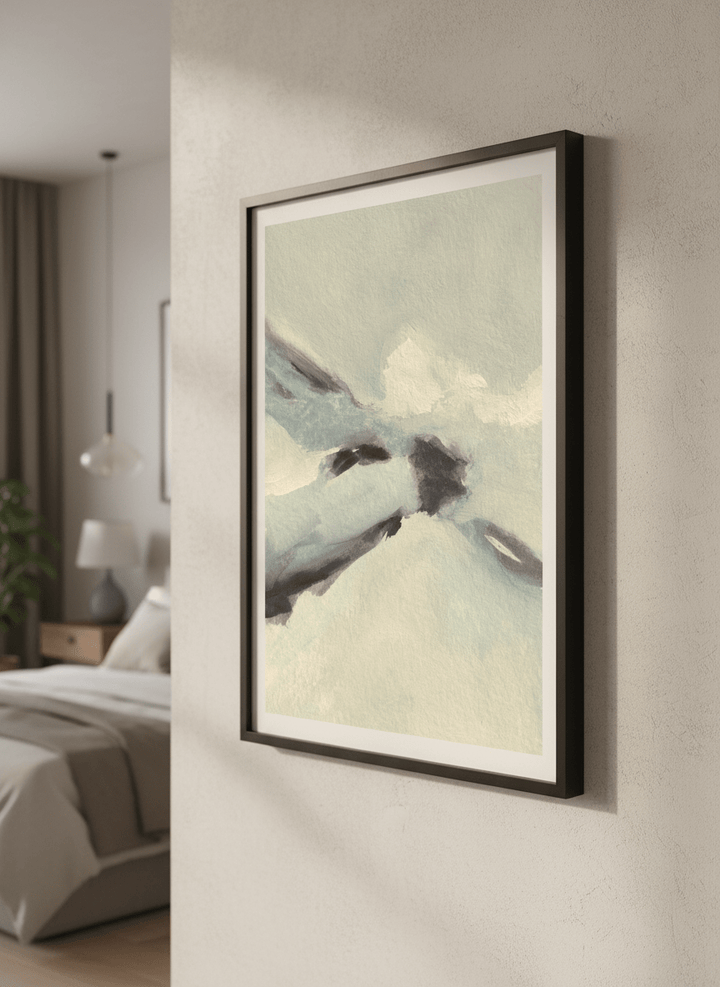 Minimalist artwork displayed in a calm, light-filled bedroom interior