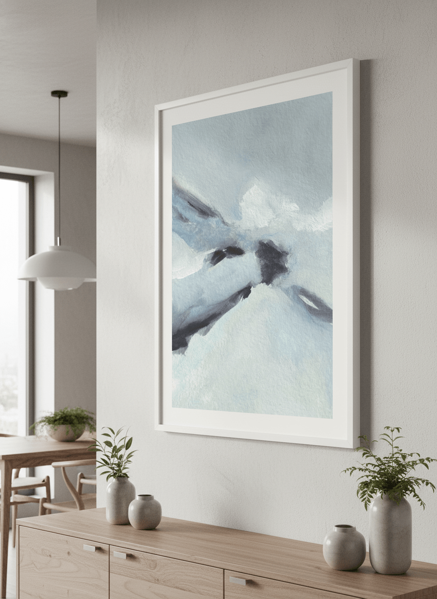 Wall art styled above a dining table in a contemporary home