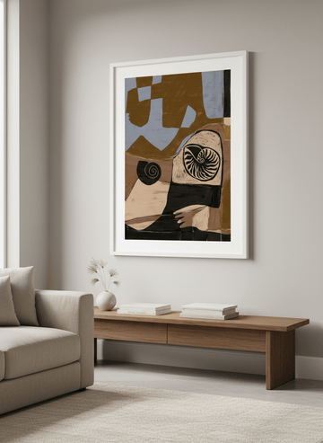 Modern wall art styled above a sofa in a neutral living room