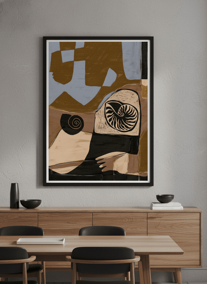 Wall art styled above a dining table in a contemporary home