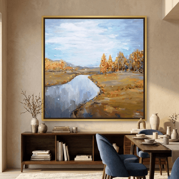 Oversized statement canvas wall art with a gold leaf surround styled in a luxe interior