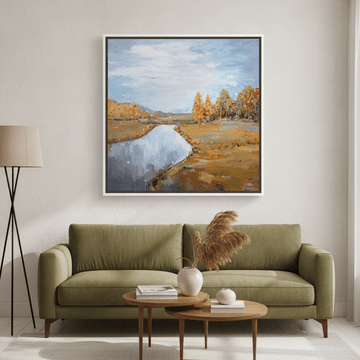 Canvas wall art with a white surround styled in a calm, light-filled bedroom