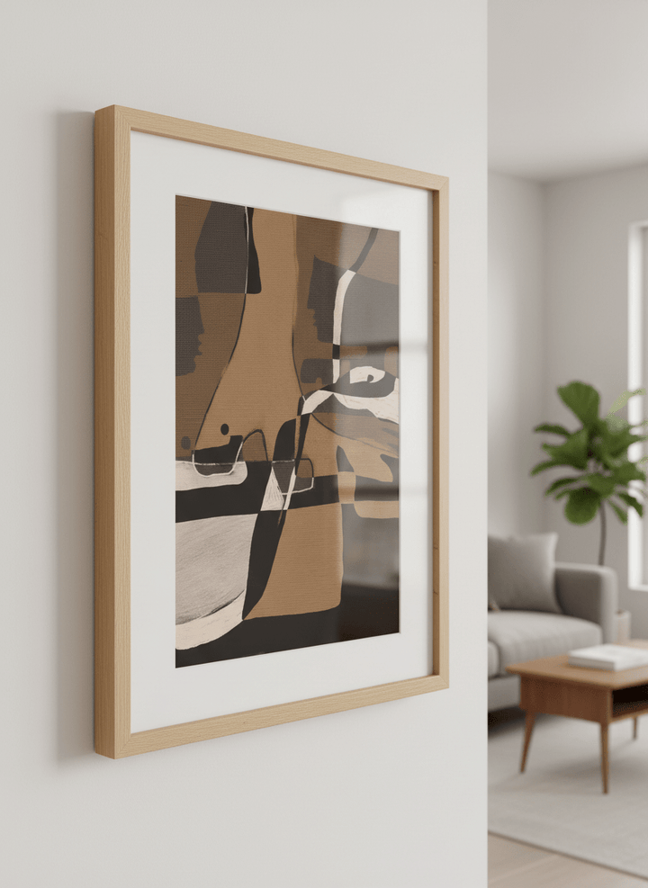 Modern wall art styled above a sofa in a neutral living room