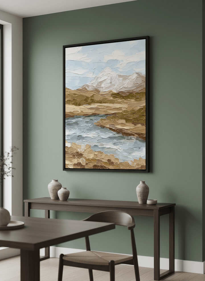 Wall art styled above a dining table in a contemporary home