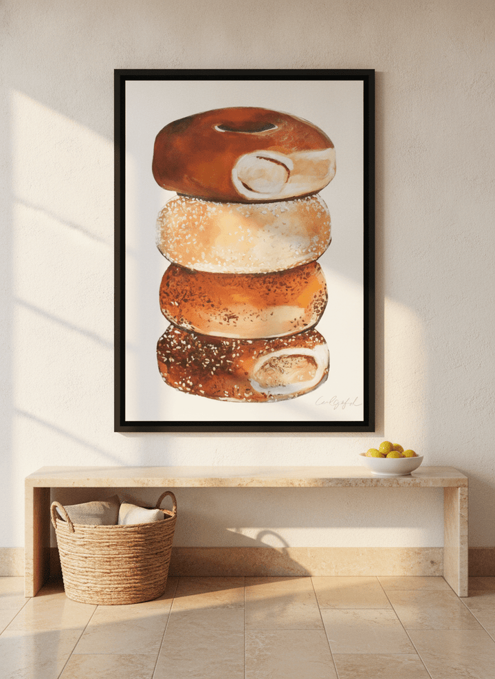 Canvas wall art with a black surround styled on the wall in a Mediterranean living room