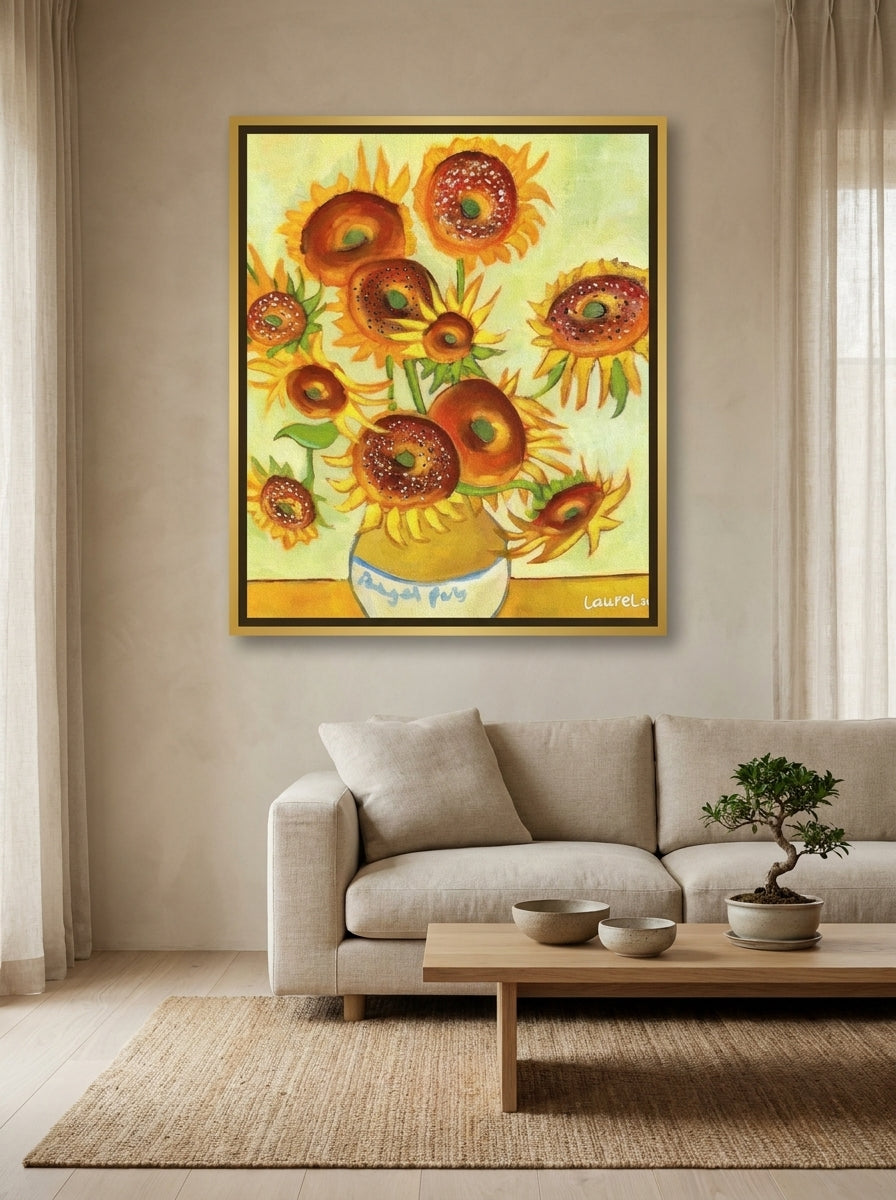 Canvas wall art with a gold leaf surround styled on the wall in a warm Japandi living room