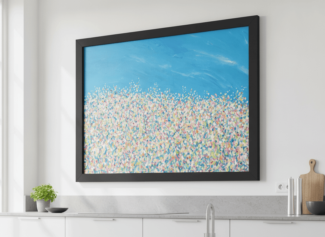 Artwork styled on the wall of a bright modern kitchen