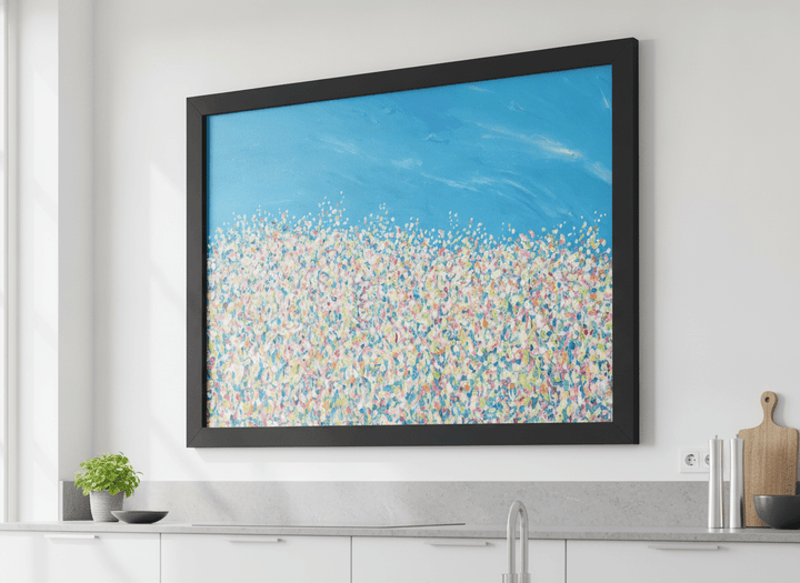 Artwork styled on the wall of a bright modern kitchen