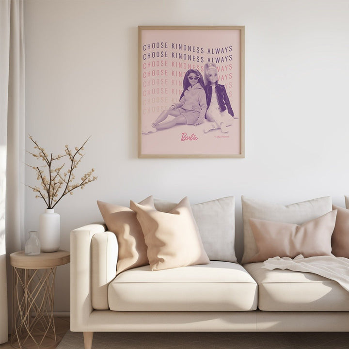 artwork of two people sitting together with text on a wall above a beige sofa.
