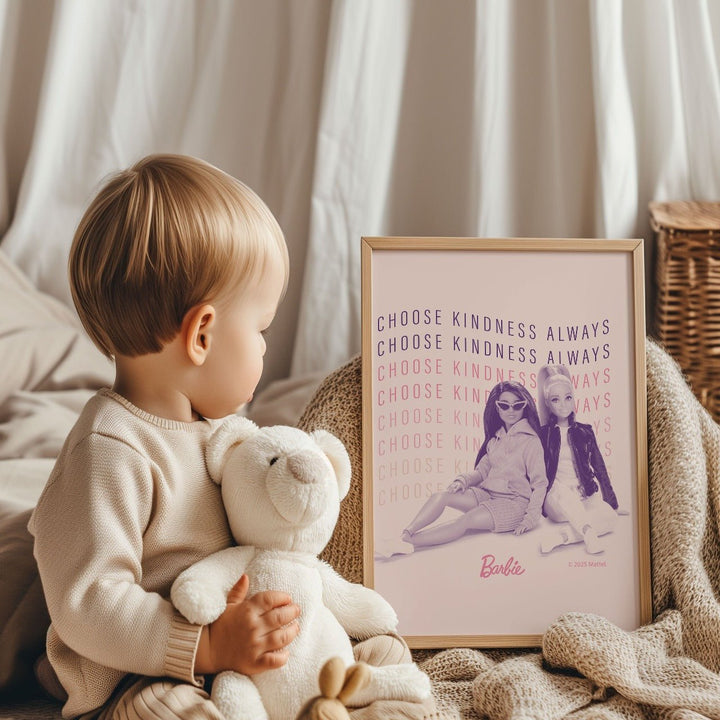 Child holding a teddy bear next to a Barbie poster with motivational text