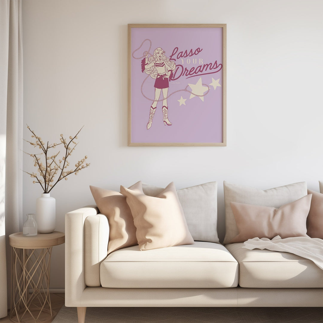 Artwork with a superhero design on a wall above a beige sofa.