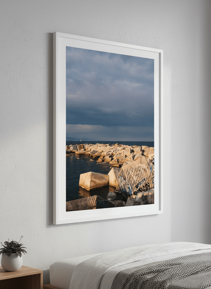 Minimalist artwork displayed in a calm, light-filled bedroom interior