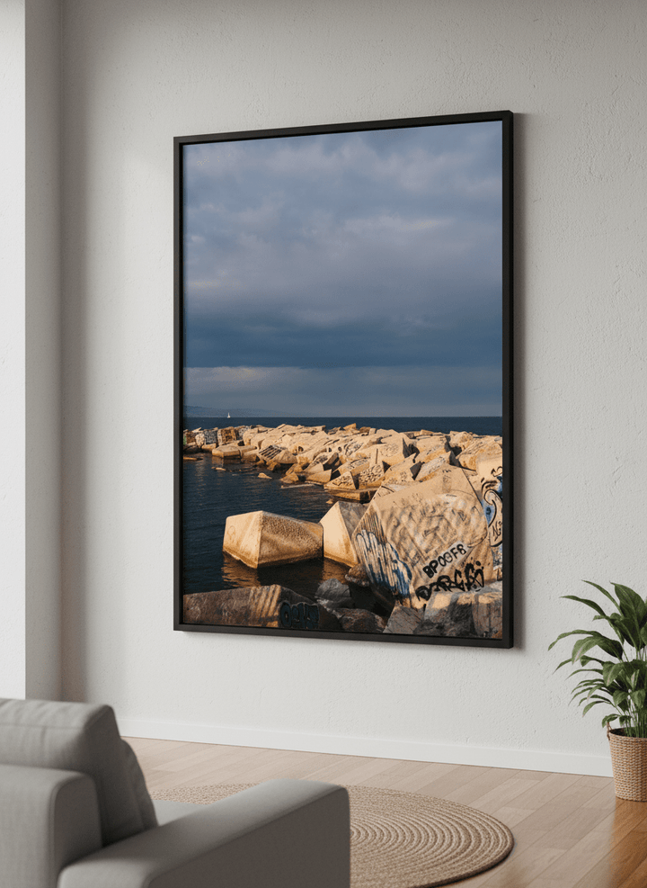 Modern wall art styled above a sofa in a neutral living room