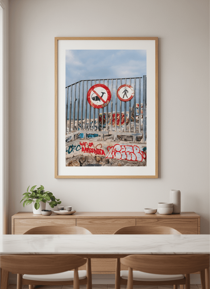 Wall art styled above a dining table in a contemporary home