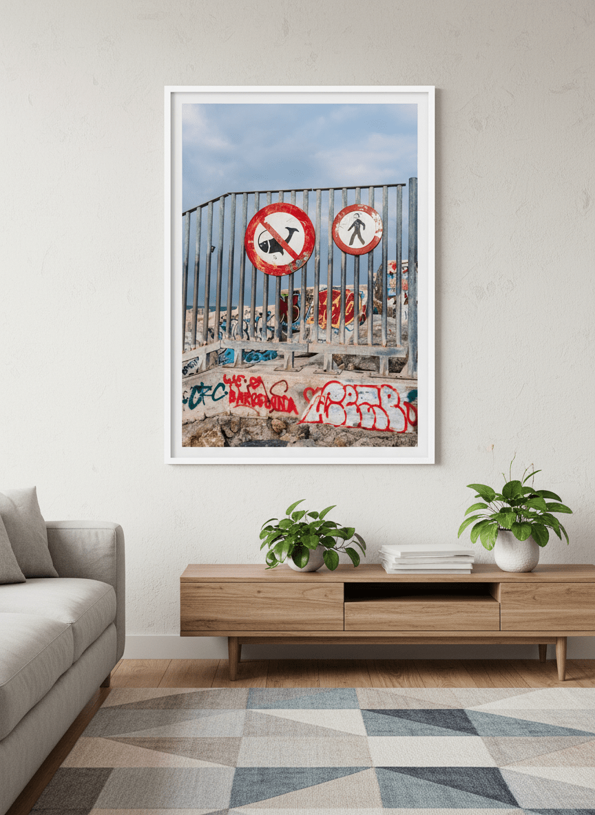 Modern wall art styled above a sofa in a neutral living room