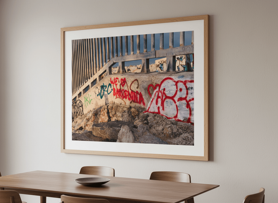Wall art styled above a dining table in a contemporary home