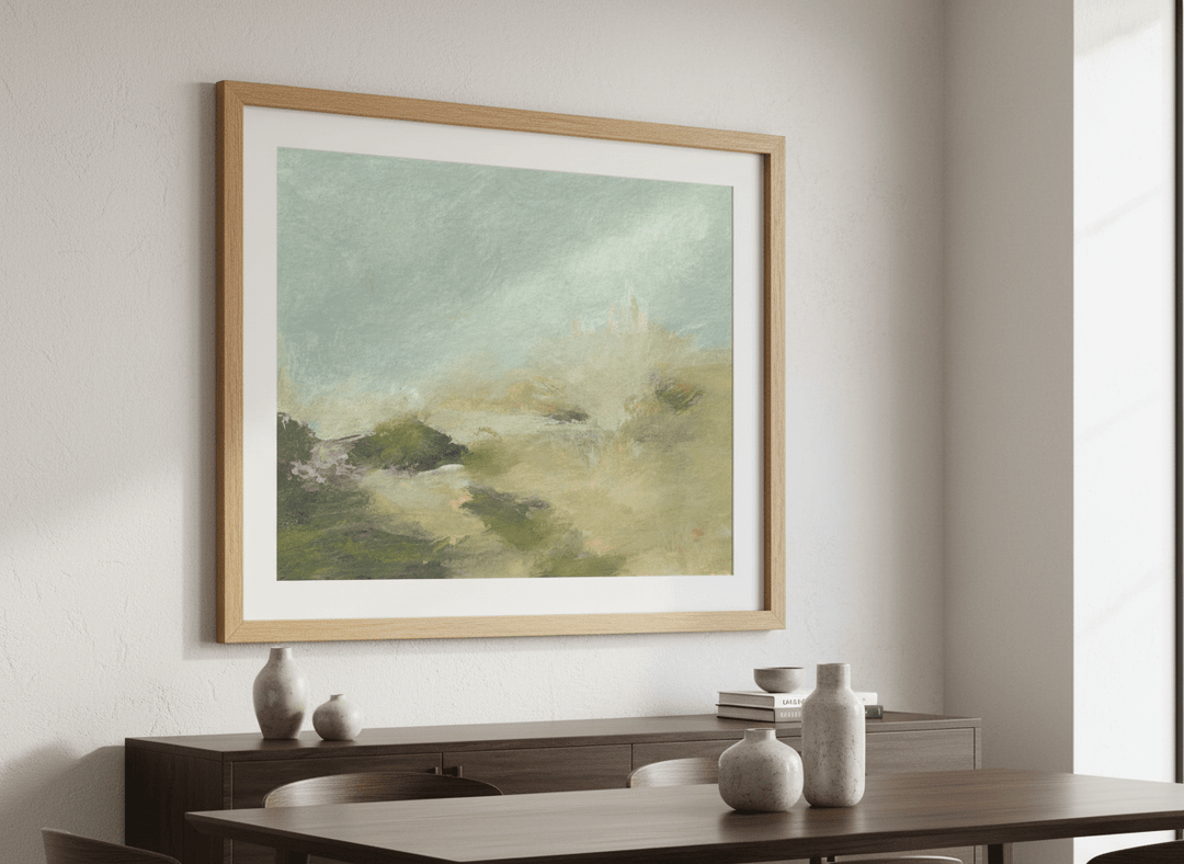 Wall art styled above a dining table in a contemporary home
