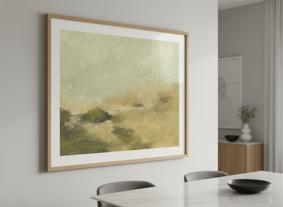 Wall art styled above a dining table in a contemporary home