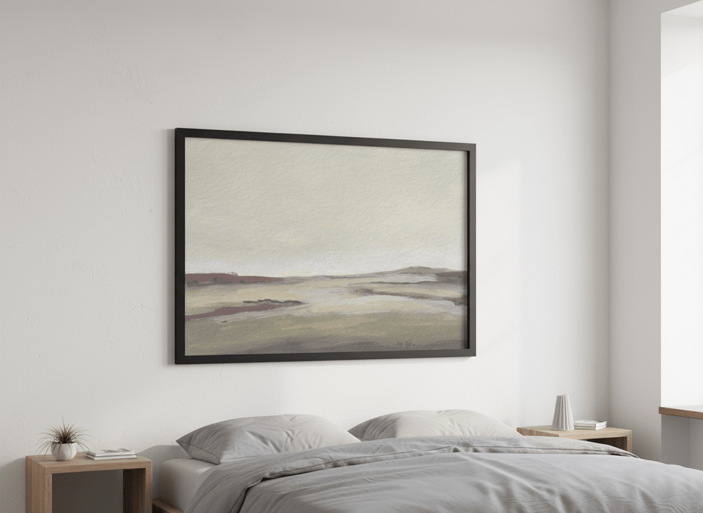 Minimalist artwork displayed in a calm, light-filled bedroom interior