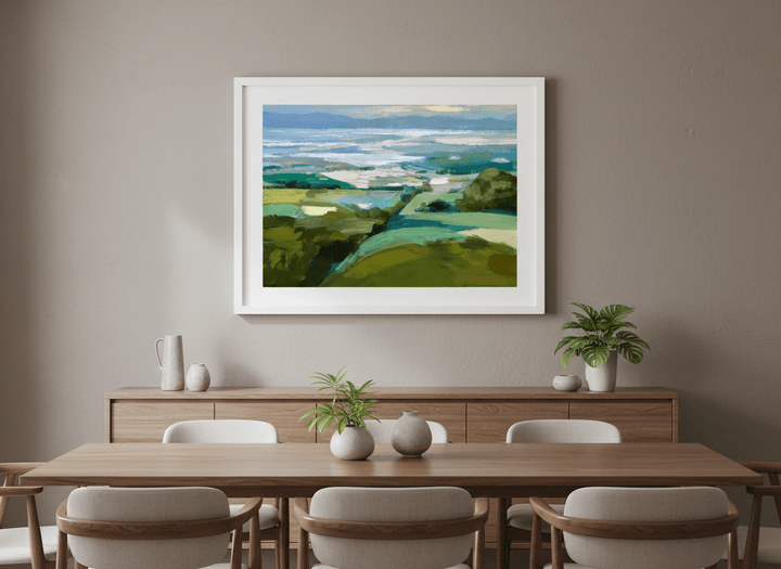 Wall art styled above a dining table in a contemporary home